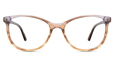 Maggie Eyeglasses in the Tut variant - it's an oval shape frame in transparent brown color front